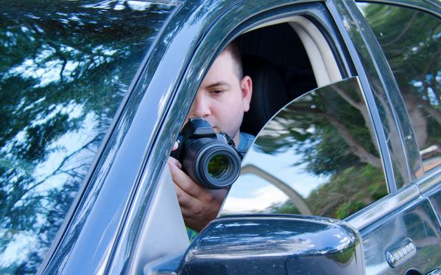 Private investigator conducting surveillance in Denver